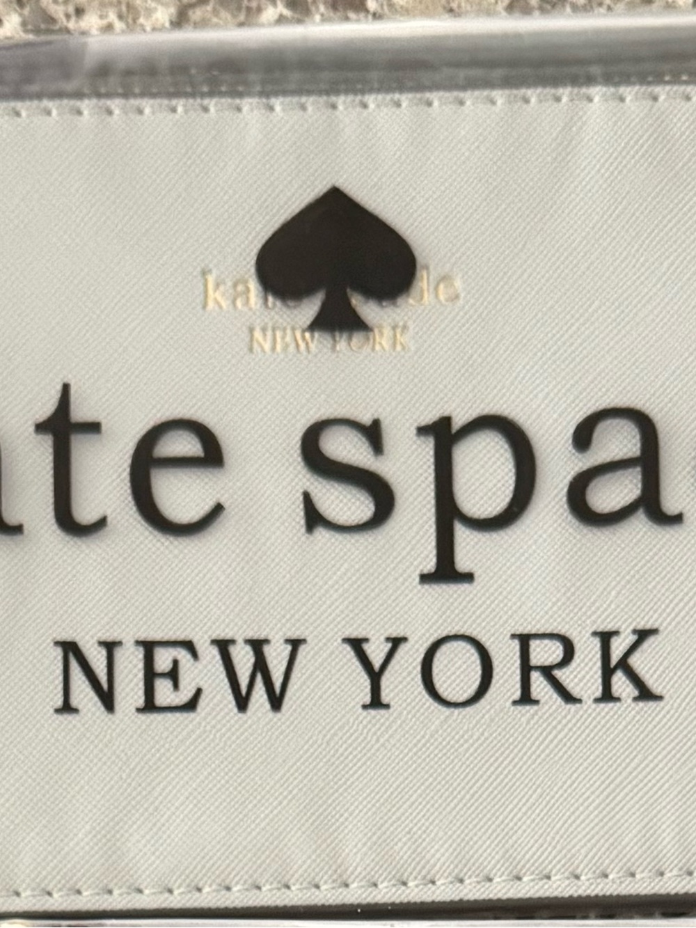 kate spade White Wallet with Black Logo and Spade Accent